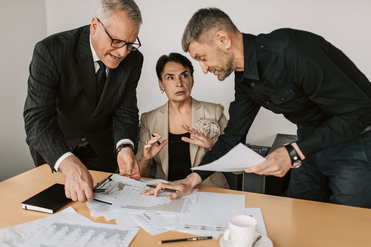 Two colleagues working through a task